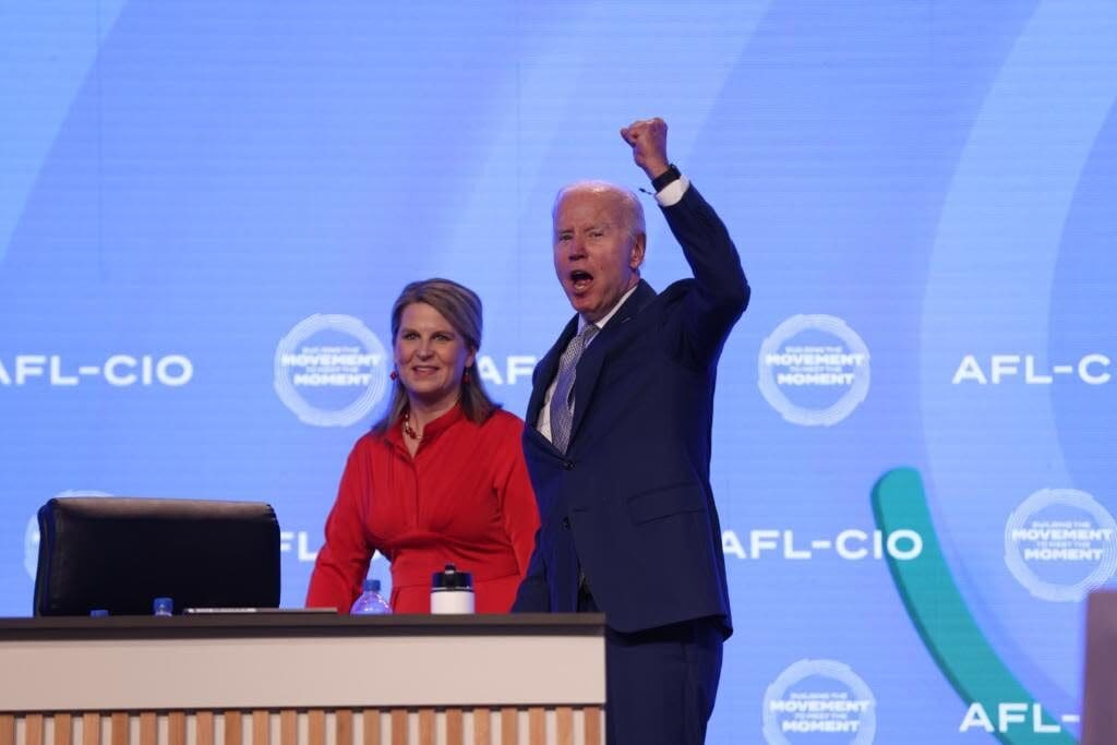 President Biden, alongside AFL-CIO President Liz Shuler, raises his fist and roars, “Union!” as he leaves the AFL-CIO Convention
